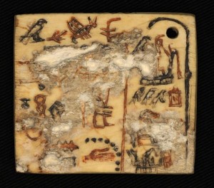 Ivory funerary label inscribed with early Egyptian hieroglyphs. 1st Dynasty (c.2900BCE) | Photo: Kathryn Piquette courtesy Trustees of the British Museum.